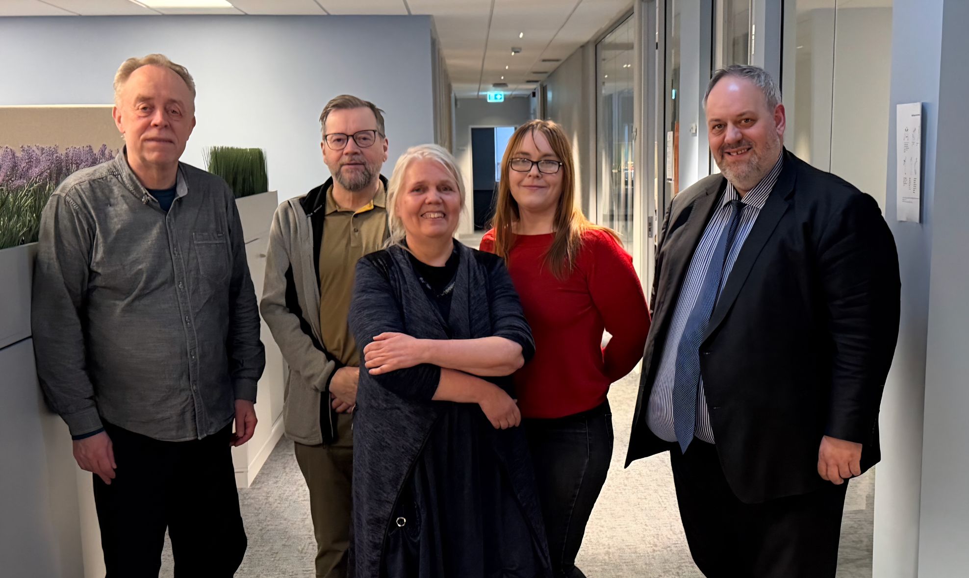 Glaðbeittir stjórnarmenn Ættfræðifélagsins líta framtíðina björtum augum